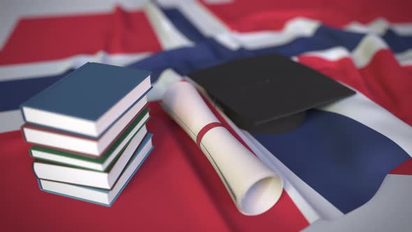 Graduation Cap and Diploma on the Norwegian Flag