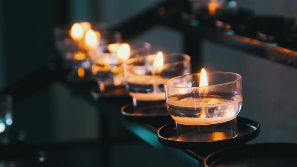 Burning Candles Inside Church Interior Prayer Candles Lit in Row Spirituality