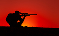 Commando sniper aiming, shooting rifle on seacoast - PhotoDune Item for Sale