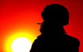 Silhouette of smoking on sunset army soldier - PhotoDune Item for Sale