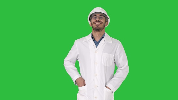 Happy engineer walking Great result on a Green Screen, Chroma Key.