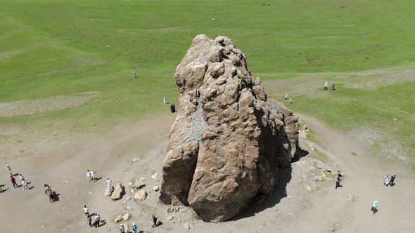 Tourists Religious Symbol Taikhar Chuluu Rock in Arkhangai Aimag, Mongolia