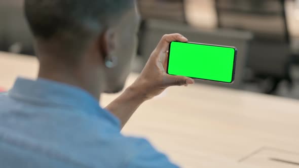 Man Watching Smartphone with Chroma Screen