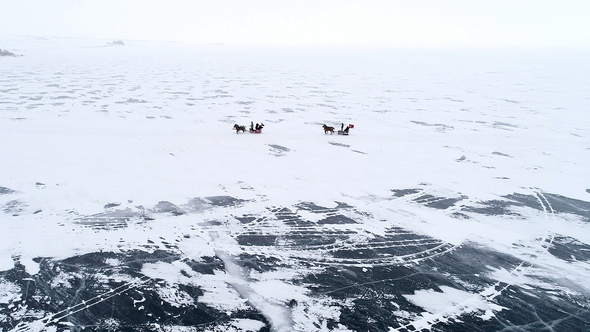 Aerial View of Frozen Lake and Sleigh Rides