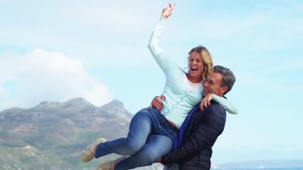 Mature couple enjoying on beach