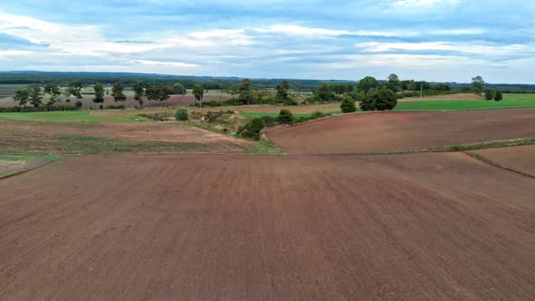 Aerial view of polish countryside meadow shot in Kaszuby, pomorskie in Poland.