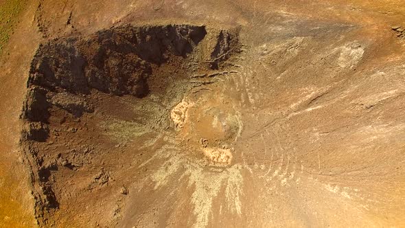 Aerial view of an arid landscape at Caldera de Gairia volcano in Fuerteventura.