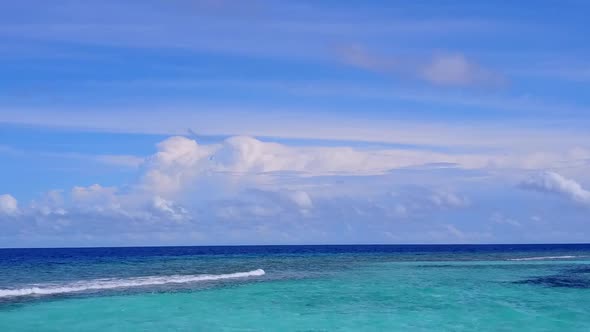 Drone aerial scenery of seashore beach journey by lagoon and sand background