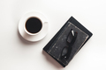 Office desk table with supplies, coffee cup and flower. Top view - PhotoDune Item for Sale