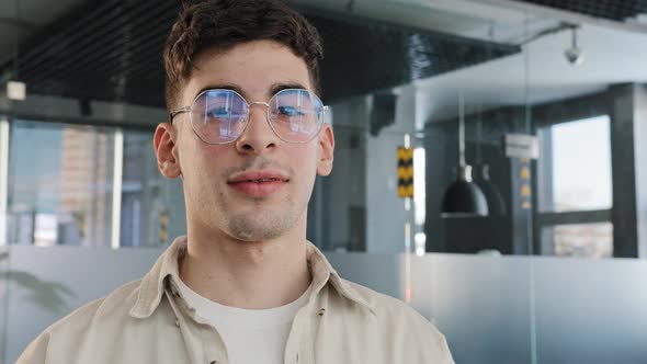 Closeup Male Portrait in Profile Caucasian Guy Student in Glasses Slowly Turns His Head Looks at