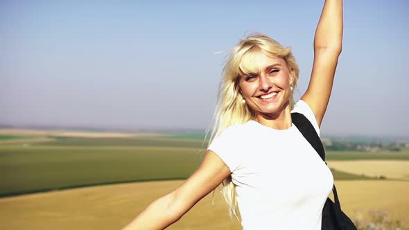 Happy Girl Smiling in Field