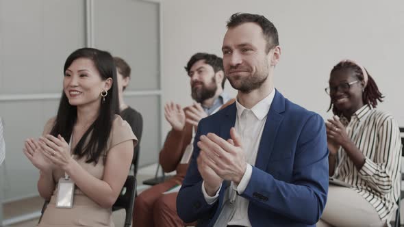 Diverse Colleagues Applauding on Meeting