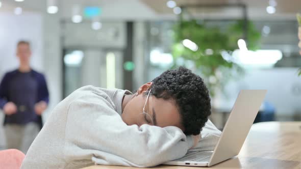 Casual African Woman with Laptop Taking Nap, Sleeping 