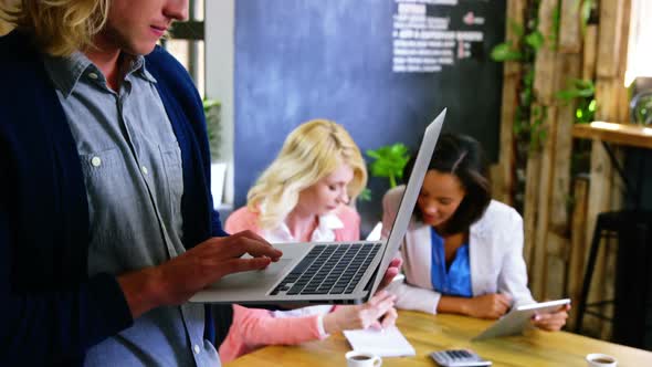 Young man using laptop