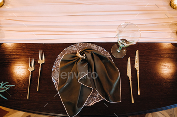 e, Cutlery on the table.