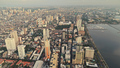 Metropolis port city of Manila at sea bay aerial view. Urban cityscape of streets and roads - PhotoDune Item for Sale
