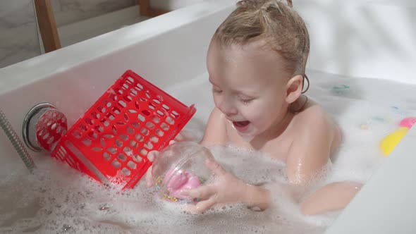 She Loves Playing with Toys in Bath