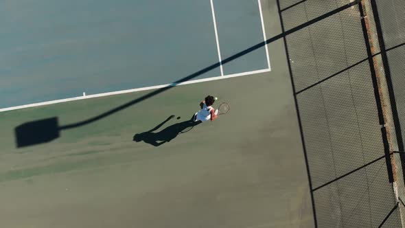 Video of top view of african american female tennis player on court