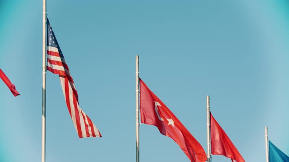 Flags of USA and Turkey Blowing in the Wind