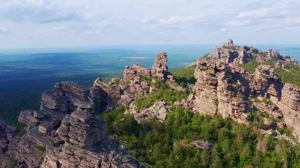 Rocks in the Mountains in the Middle of a Dense Green Forest