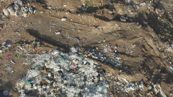Aerial Shot of Rubbish Pile Lying Among Countryside