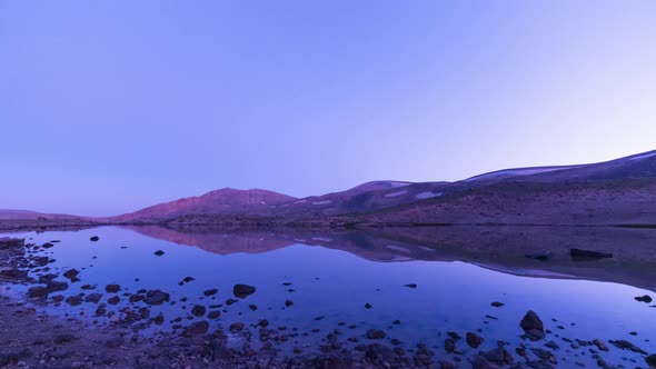 Venus Belt in Pink Blue Sky after Sunset Twilight in landscape of Beautiful Lake in Mountain Highlan