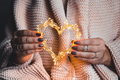 glowing heart in the hands of a woman. Happy Valentine's day - PhotoDune Item for Sale