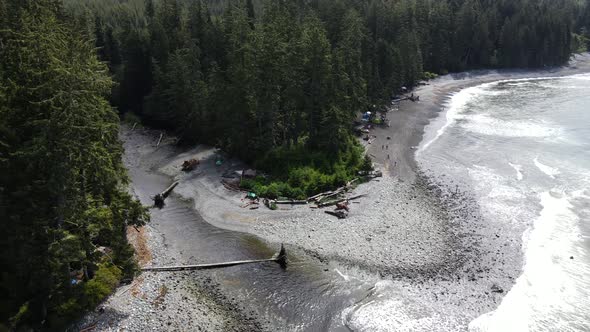 Drone ascending while flying backwards at Sombrio beach on Vancouver Island. Remote and untouched pa