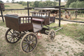 A Wooden Old Horse Carriage in an Old Cowboy Farm with a Beautiful Pony and Horses - PhotoDune Item for Sale