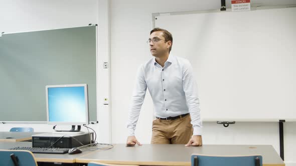 Caucasian Male Teacher Explaining Material to Pupils