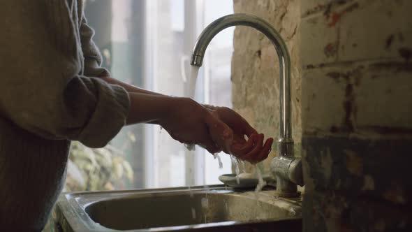 Woman Is Washing Hands From Paint