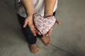 Baby boy hands giving toy heart. - PhotoDune Item for Sale