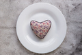 Red heart on plate on wooden background. - PhotoDune Item for Sale