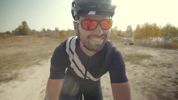 Cycling On Countryside Road Twists Pedals And Riding.Cyclist Taking Selfie Video When Riding On Bike