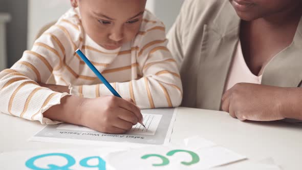 African-American Girl Studying English Alphabet