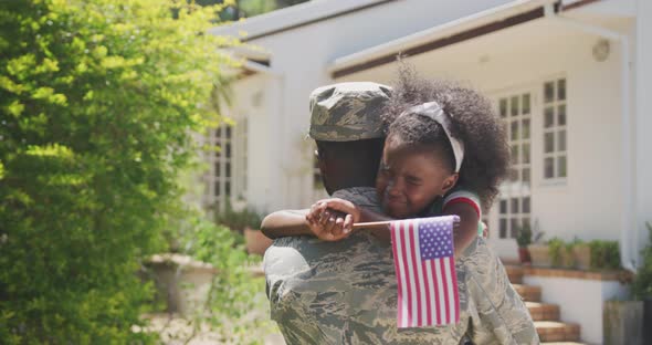 Father and daughter hugging each other