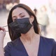 Slow Motion of Pretty Hispanic Middle Aged Woman Take Off Mask - VideoHive Item for Sale