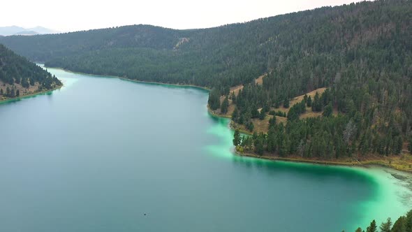 Flying high over Cliff Lake in Montana viewing the aqua colors in the water