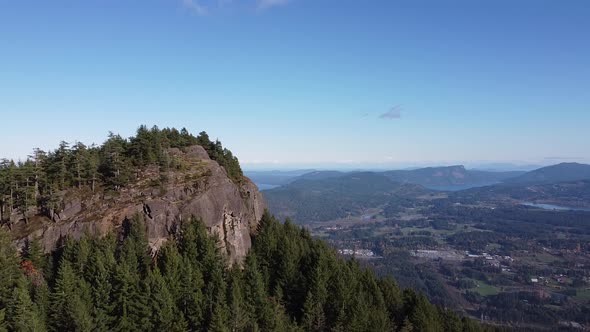 Mount Prevost, Vancouver Island. Rocky cliffs and tree-covered forest.