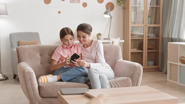 Mom and Kid Making Selfie at Home