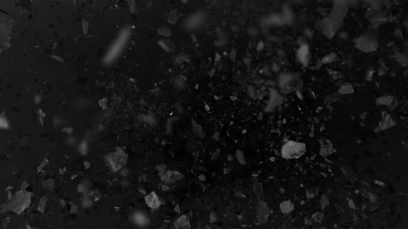 Super Slow Motion Shot of Coal Explosion Isolated On Black Background at 1000 Fps.