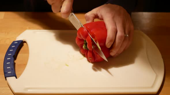 Cutting fresh red pepper