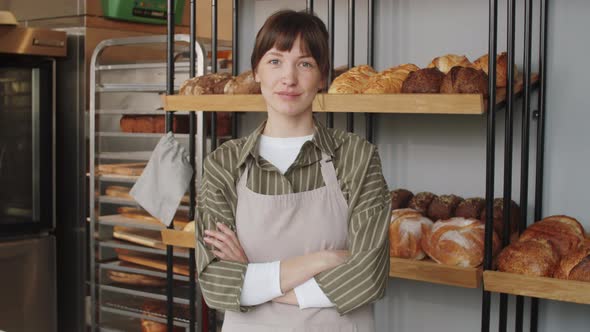 Portrait of Beautiful Female Baker at Work