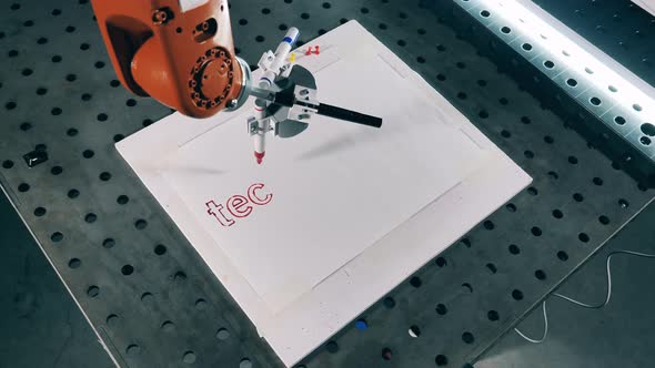 Fast Motion of a Robotic Machine Writing on Paper with a Sharpie