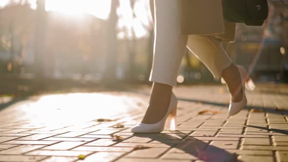 Unrecognizable Beautiful Business Woman Legs High Heels Walks Through City Park