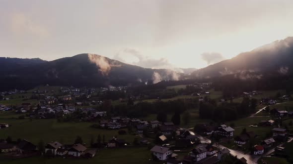 Panoramic View of a Picturesque Mountain Valley with a Village in a Lowland