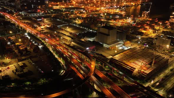 Aerial footage of Yantian container terminal at night in Shenzhen city, China, Hyperlapse