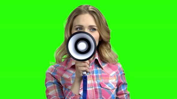 Young Happy Woman Speaking with Megaphone