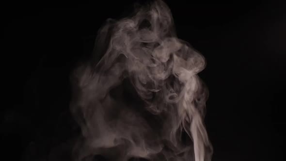 White smoke, fog, mist, vapor on a black background.