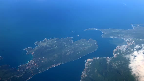 View from the airplane window on the islands of Croatia. View from top to bottom on the earth. Zadar